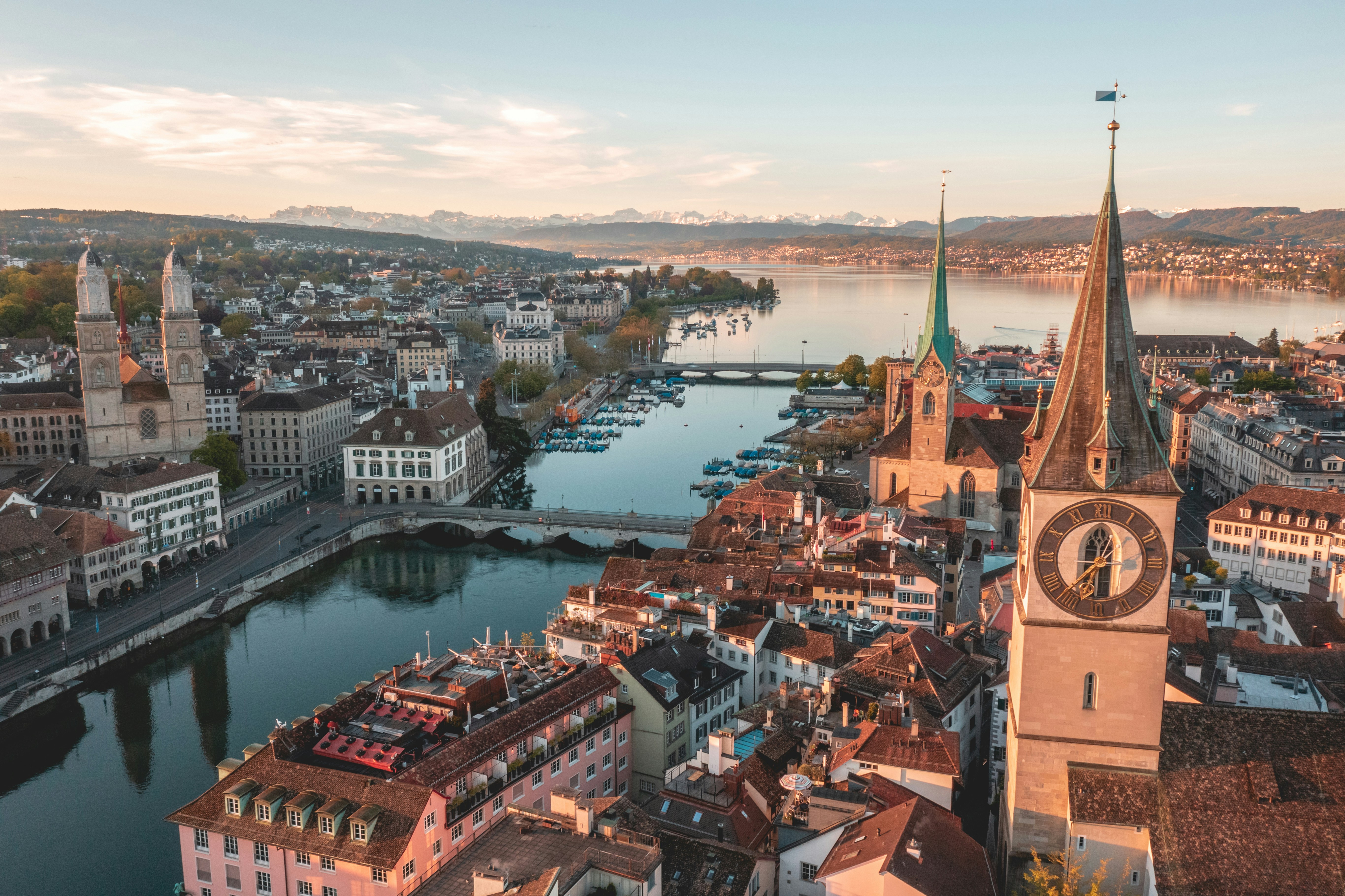 Zurich aerial view at sunrise with river and mountains